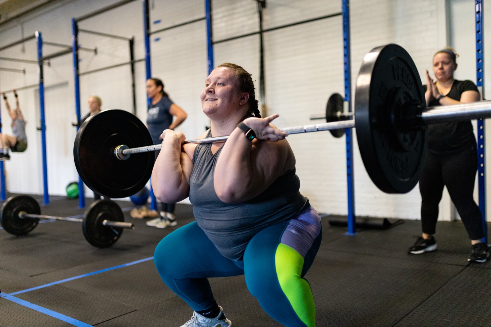 A member at the bottom of a front squat