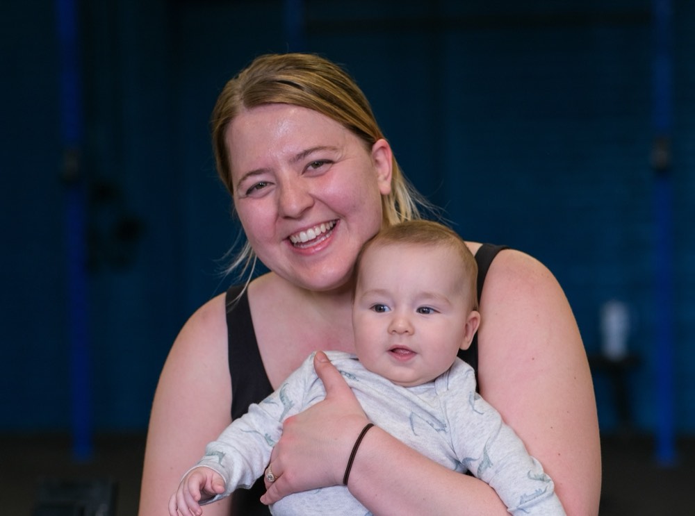 A MomFit member with her baby